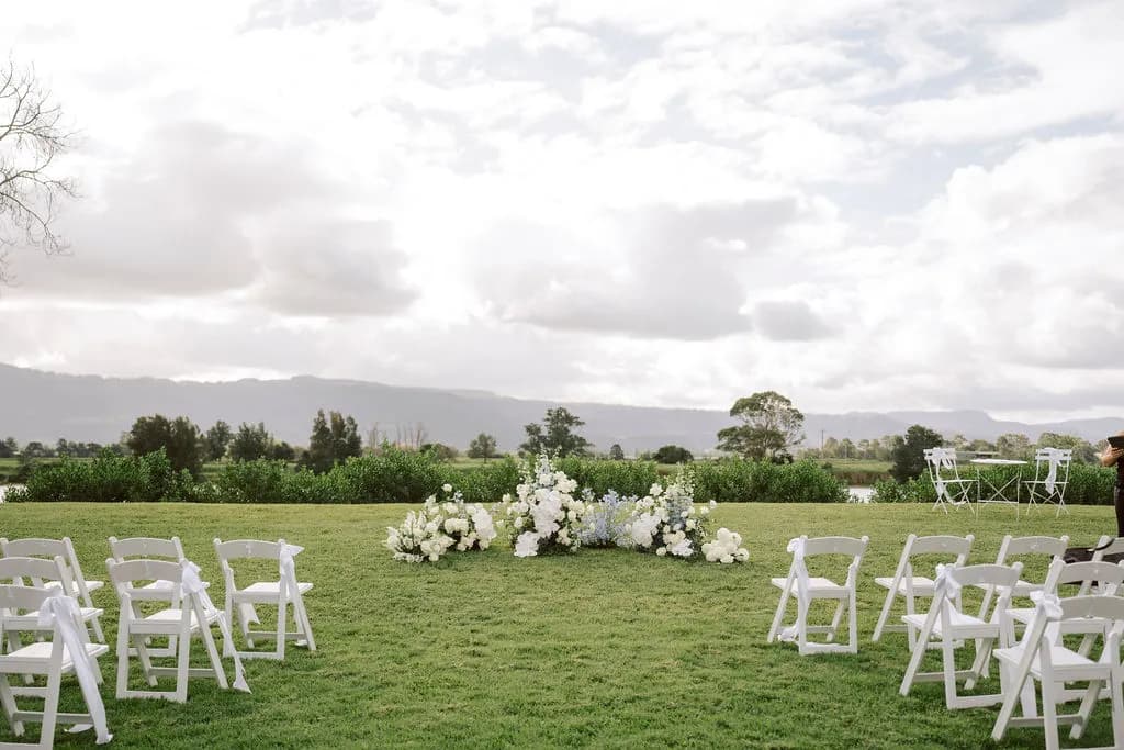 Rebecca and Timothy on the riverbank at Terara Riverside Gardens